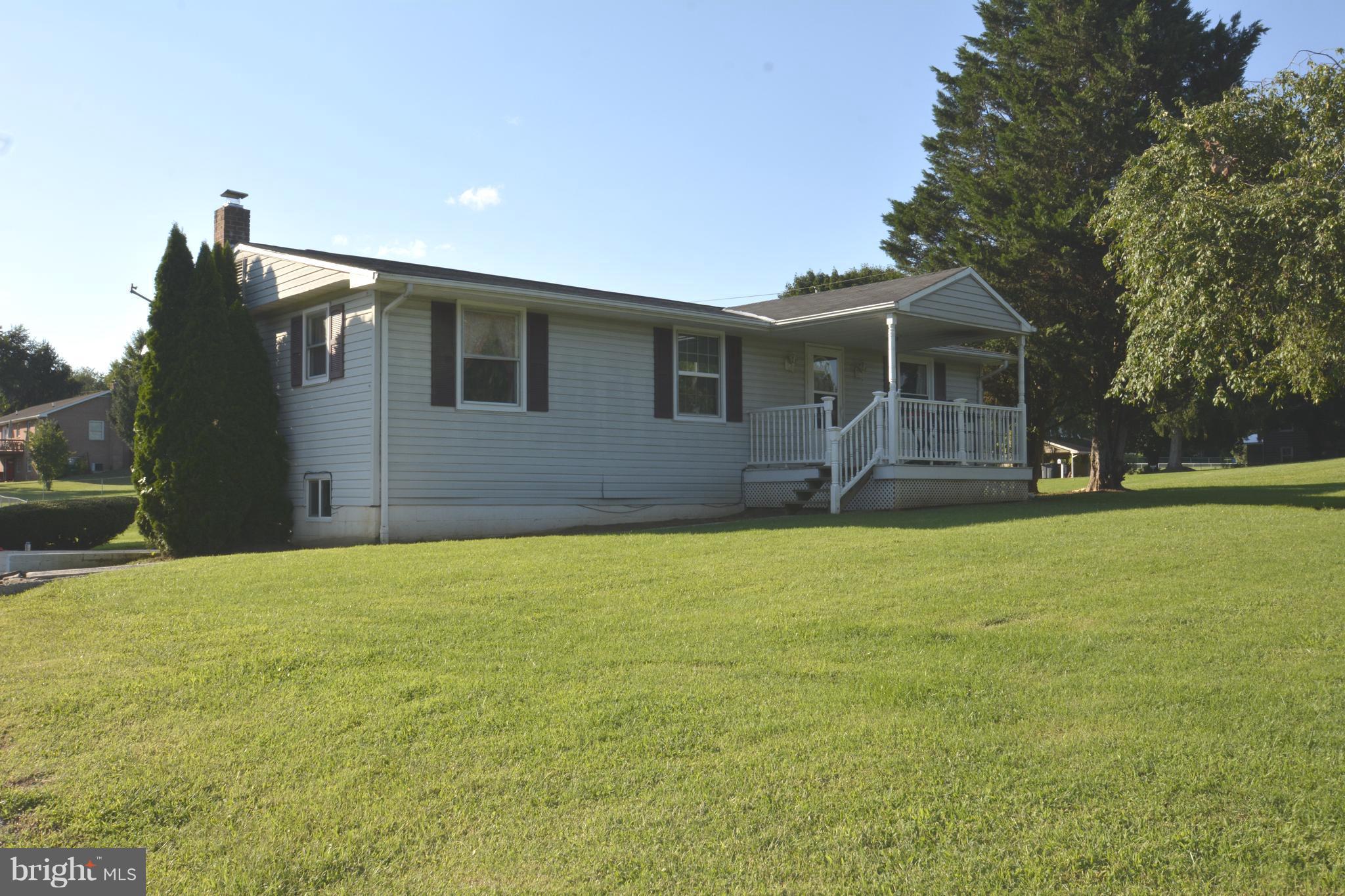 165 Lockhouse Road Falling Waters, WV 25419 - Photo 16 of 18 a house view with swimming pool in front of it