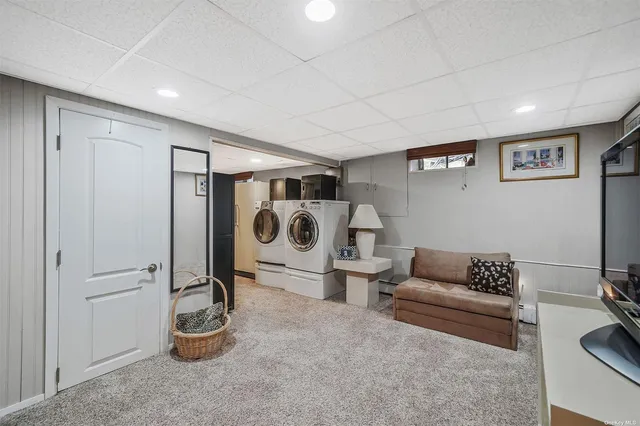 a living room with furniture and a table