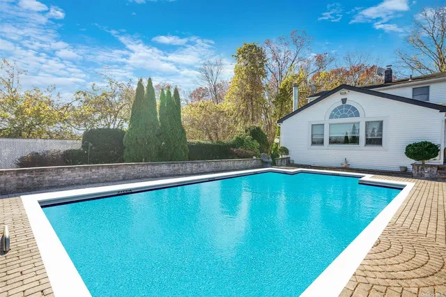 a view of outdoor space yard and swimming pool