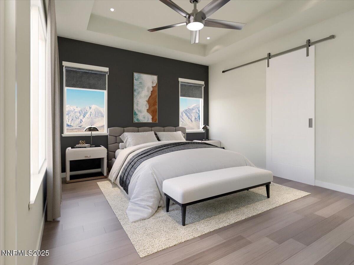 2756 Squires Street Minden, NV 89423 - Photo 8 of 10 a bedroom with a bed and a chandelier