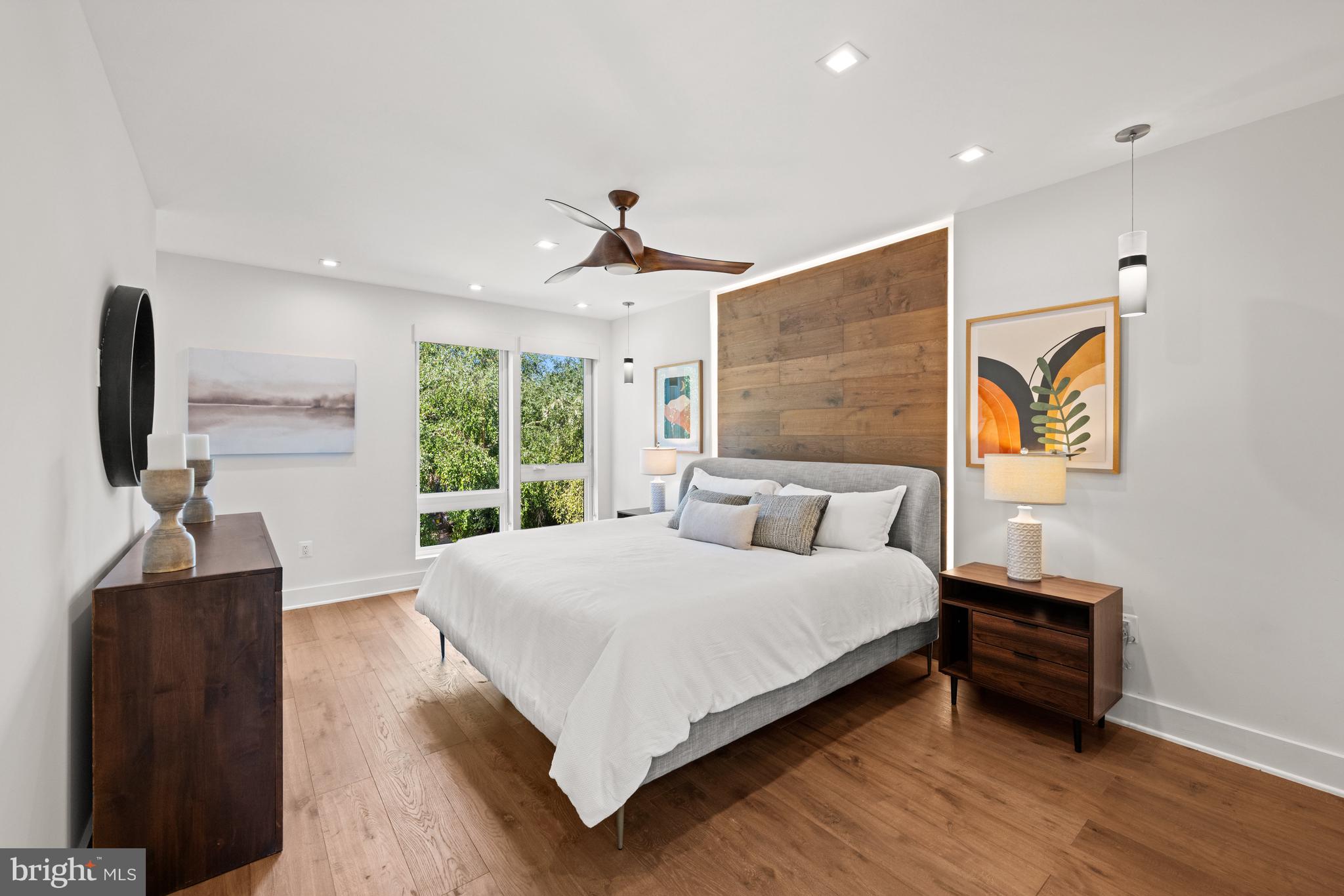 3728 R Street Northwest Washington, DC 20007 - Photo 10 of 34 a bedroom with a bed and a flat screen tv