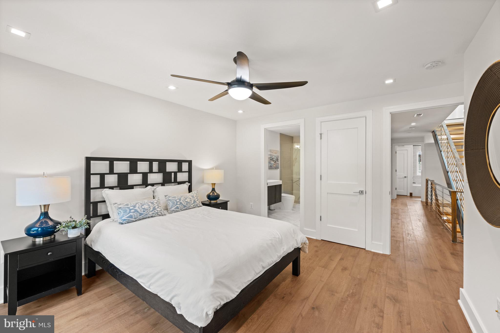 3728 R Street Northwest Washington, DC 20007 - Photo 17 of 34 a bedroom with a bed and a chandelier