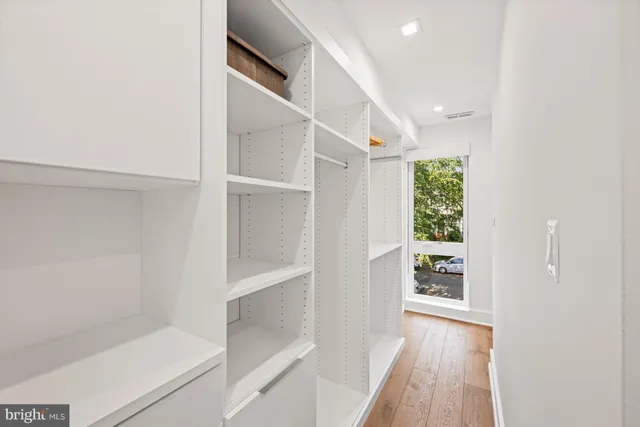 a view of entryway with wooden floor