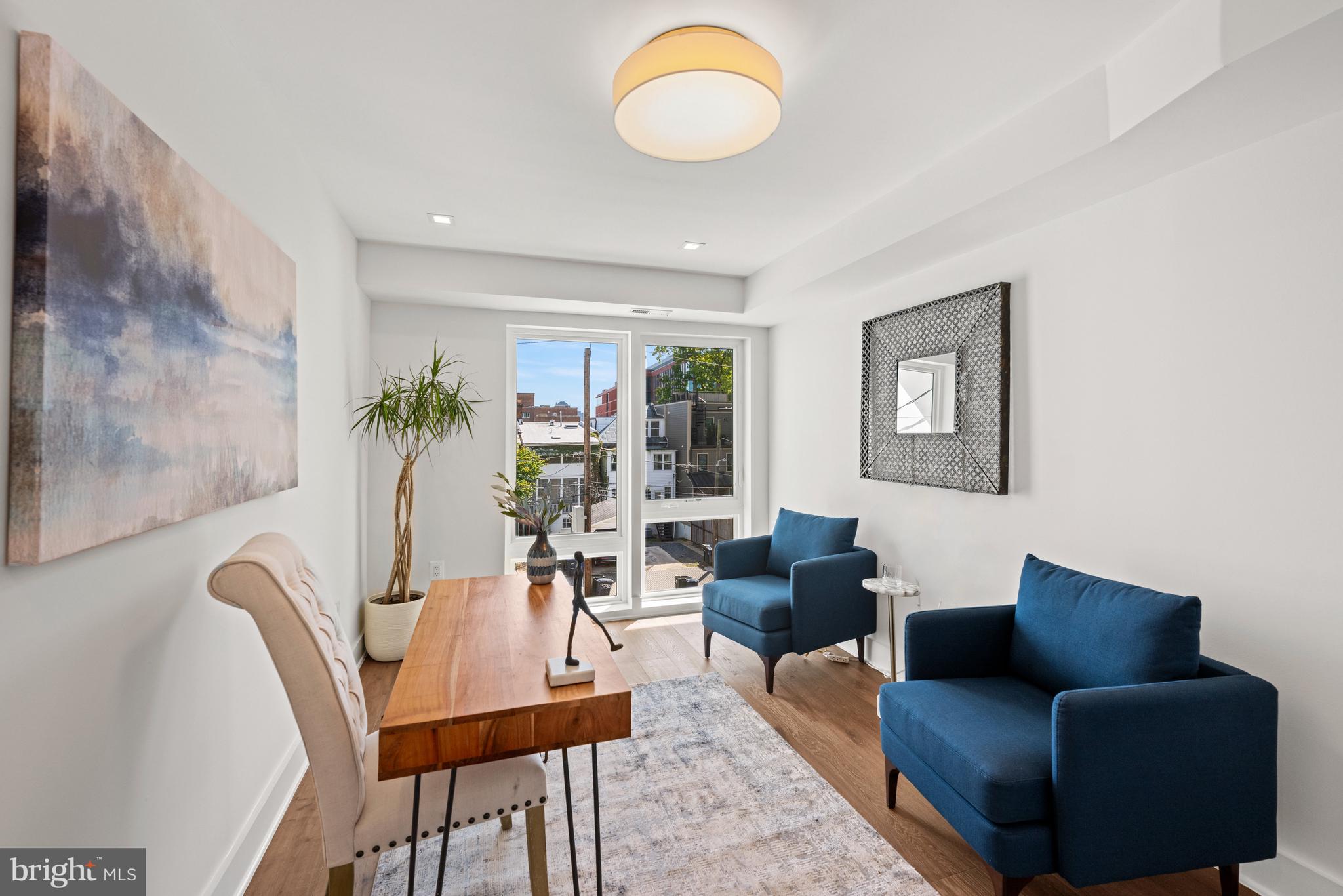 3728 R Street Northwest Washington, DC 20007 - Photo 20 of 34 a living room with furniture and a window