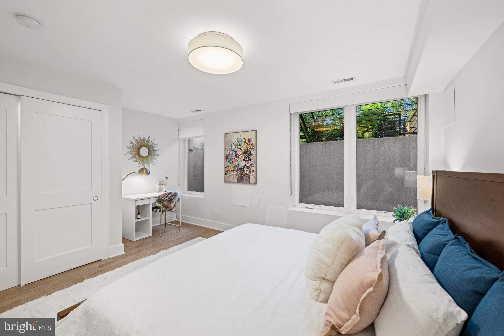 3728 R Street Northwest Washington, DC 20007 - Photo 24 of 34 a bedroom with a bed and wooden floor