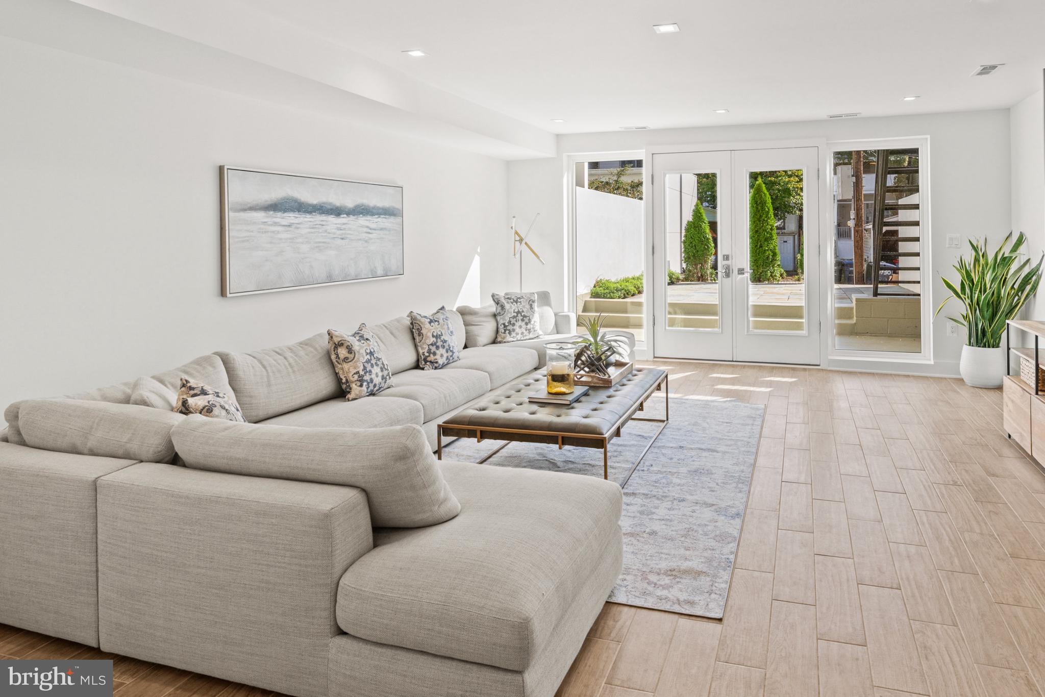 3728 R Street Northwest Washington, DC 20007 - Photo 8 of 34 a living room with furniture and a large window