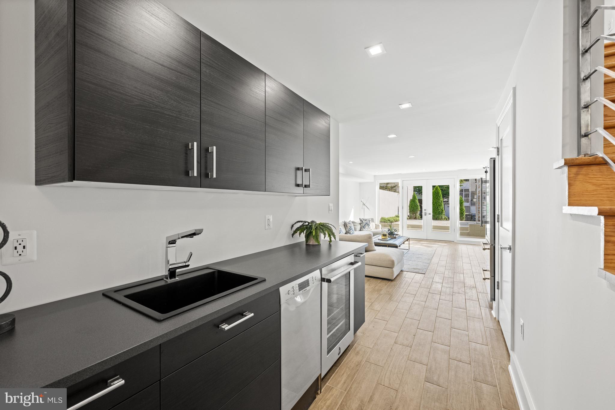 3728 R Street Northwest Washington, DC 20007 - Photo 9 of 34 a kitchen with a sink and cabinets