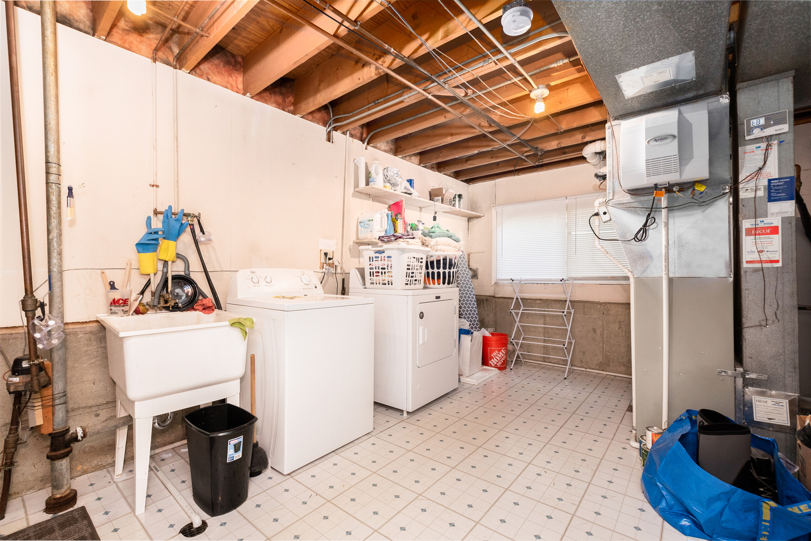 417 South River Road Naperville, IL 60540 - Photo 22 of 26 a utility room with dryer and washer