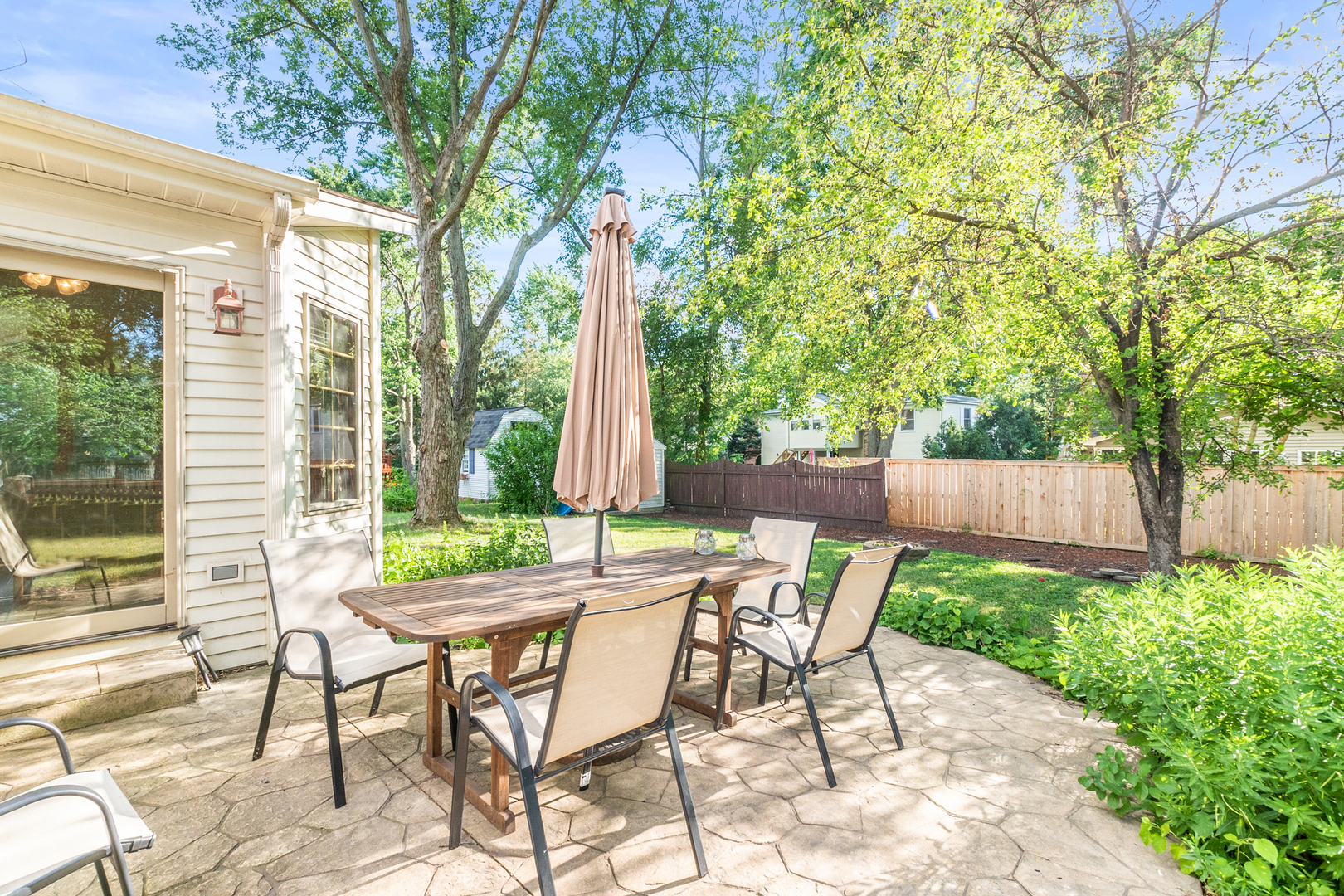 417 South River Road Naperville, IL 60540 - Photo 23 of 26 a view of an outdoor space with a patio
