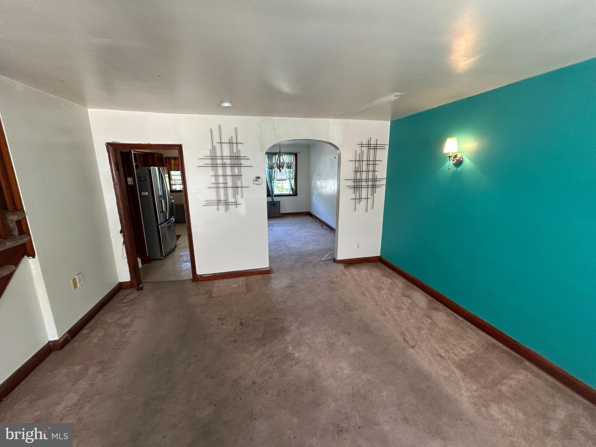 4014 Century Road Baltimore, MD 21206 - Photo 6 of 19 a view of an empty room with closet and mirror