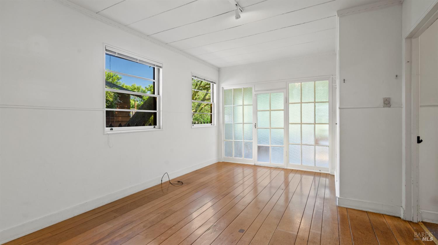 22 Oak Road Fairfax, CA 94930 - Photo 22 of 47 Main floor bedroom with attached sitting room or study, small multi use area.