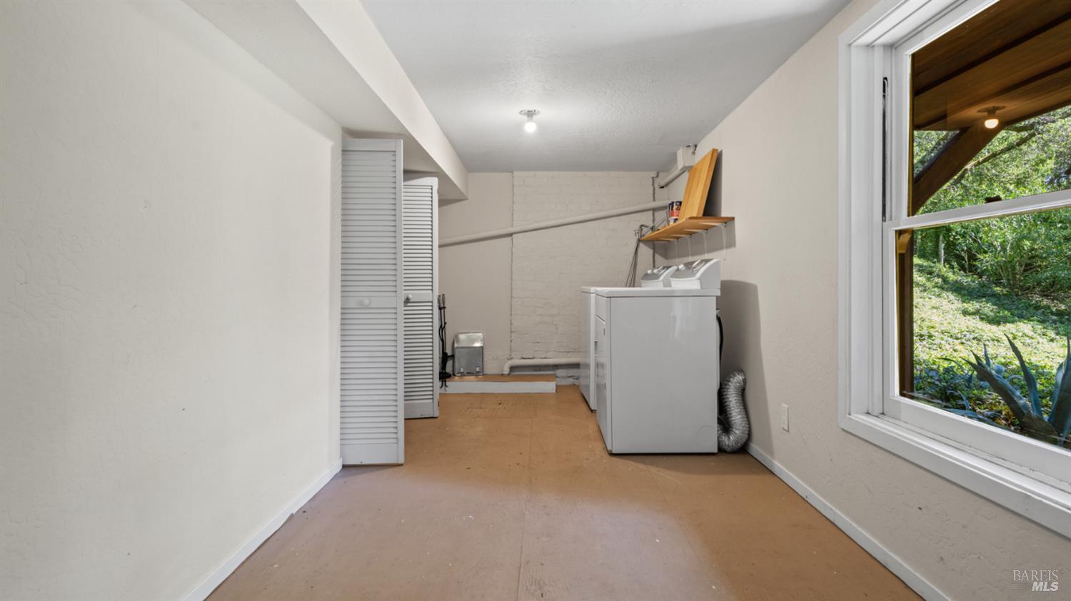 22 Oak Road Fairfax, CA 94930 - Photo 34 of 47 Laundry room/work room and partially finished basement area.