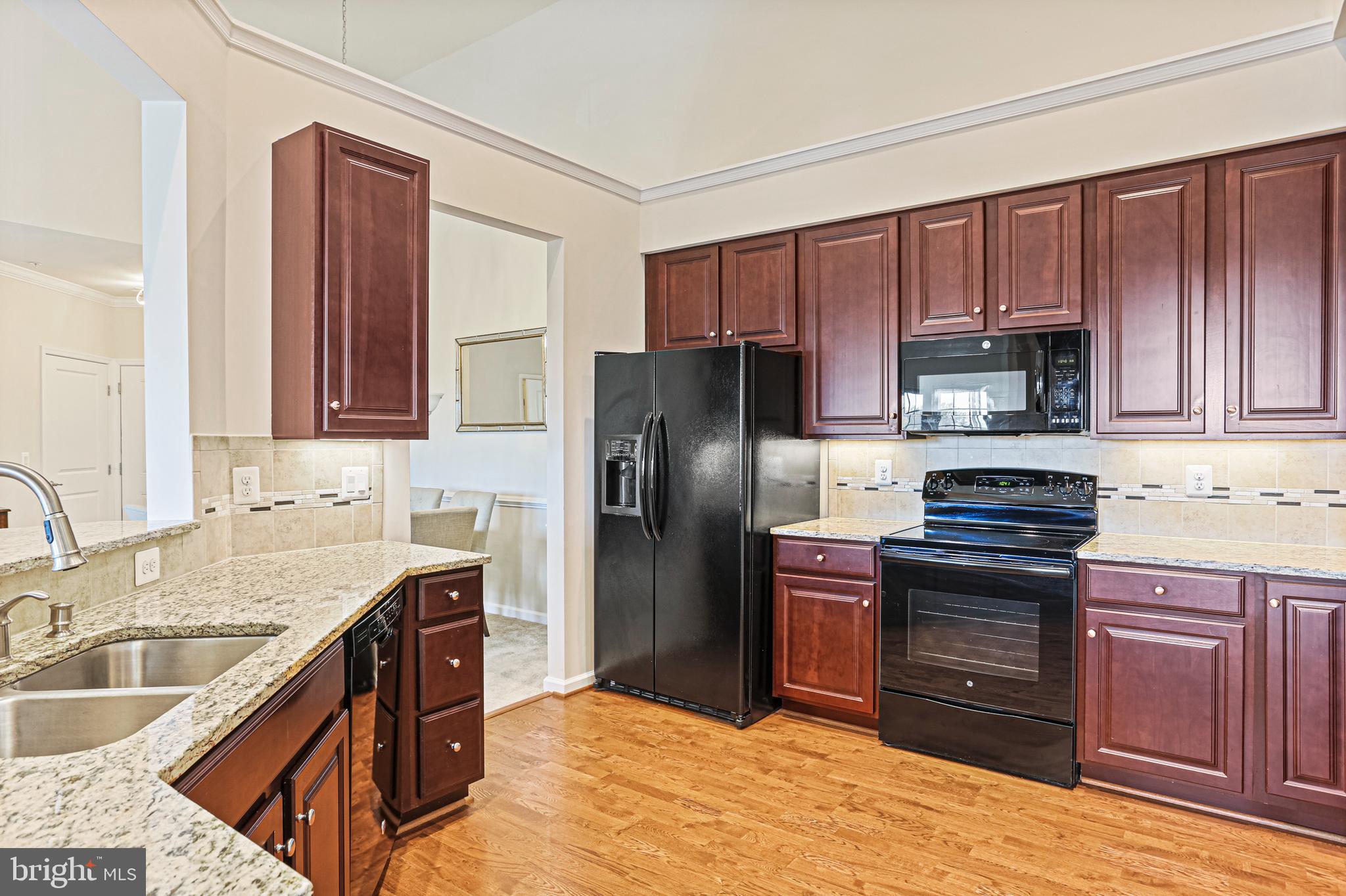 8420 Ice Crystal Drive, Unit P Laurel, MD 20723 - Photo 10 of 32 Updated kitchen - so much cabinet & counter space!