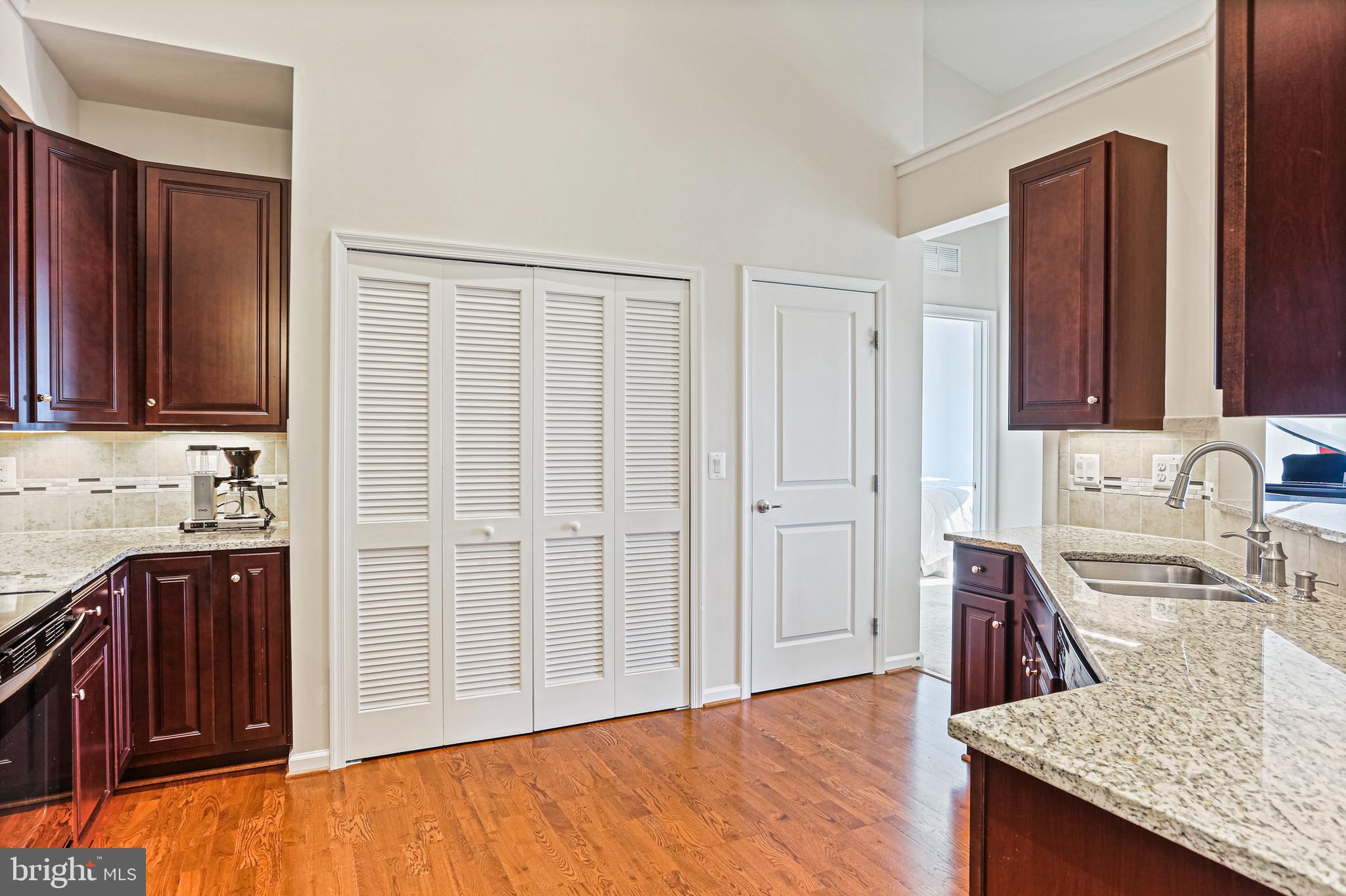 8420 Ice Crystal Drive, Unit P Laurel, MD 20723 - Photo 11 of 32 Pantry and laundry closet in the kitchen