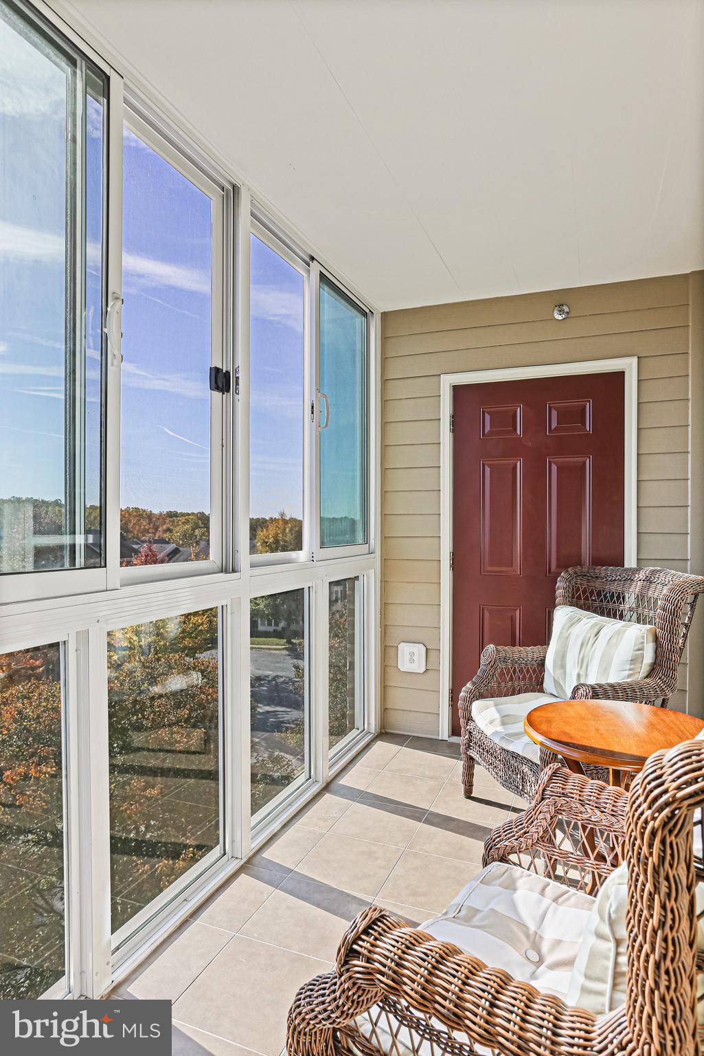8420 Ice Crystal Drive, Unit P Laurel, MD 20723 - Photo 15 of 32 Enclosed balcony with views to the beautiful trees