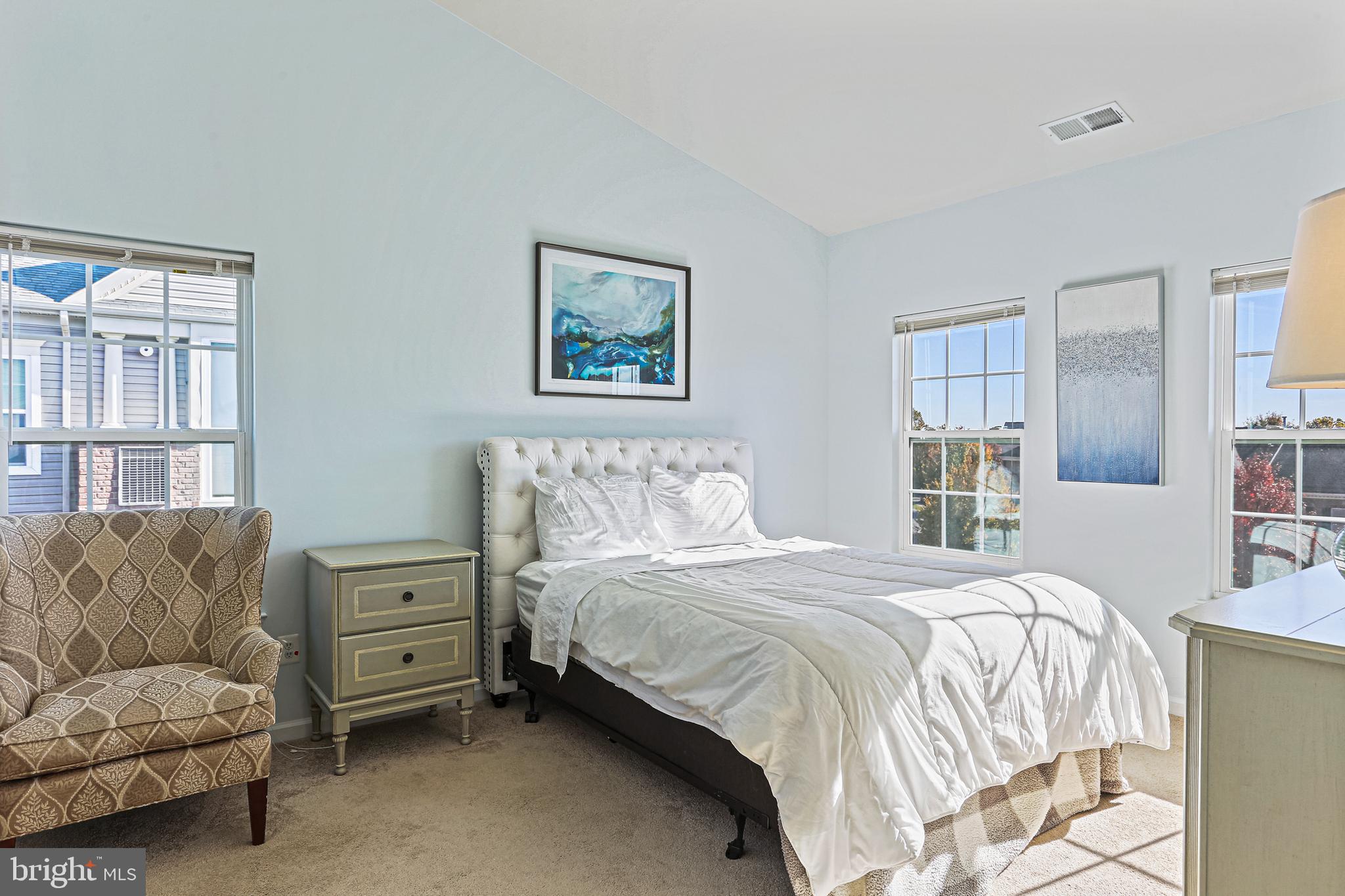 8420 Ice Crystal Drive, Unit P Laurel, MD 20723 - Photo 17 of 32 Primary bedroom with vaulted ceilings