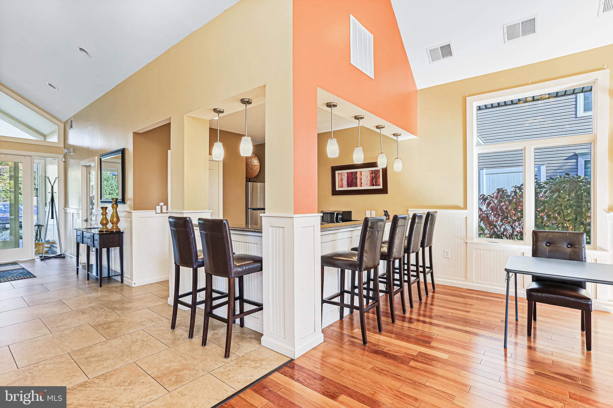 8420 Ice Crystal Drive, Unit P Laurel, MD 20723 - Photo 26 of 32 Kitchen and bar seating at the clubhouse