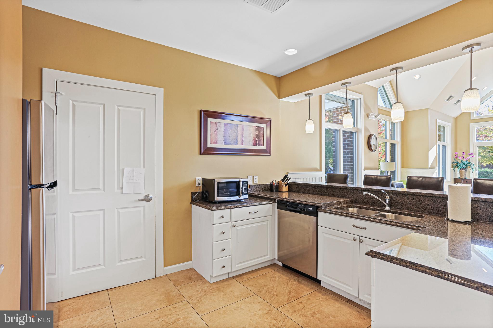 8420 Ice Crystal Drive, Unit P Laurel, MD 20723 - Photo 27 of 32 Hosting friends & family in the clubhouse is easy!