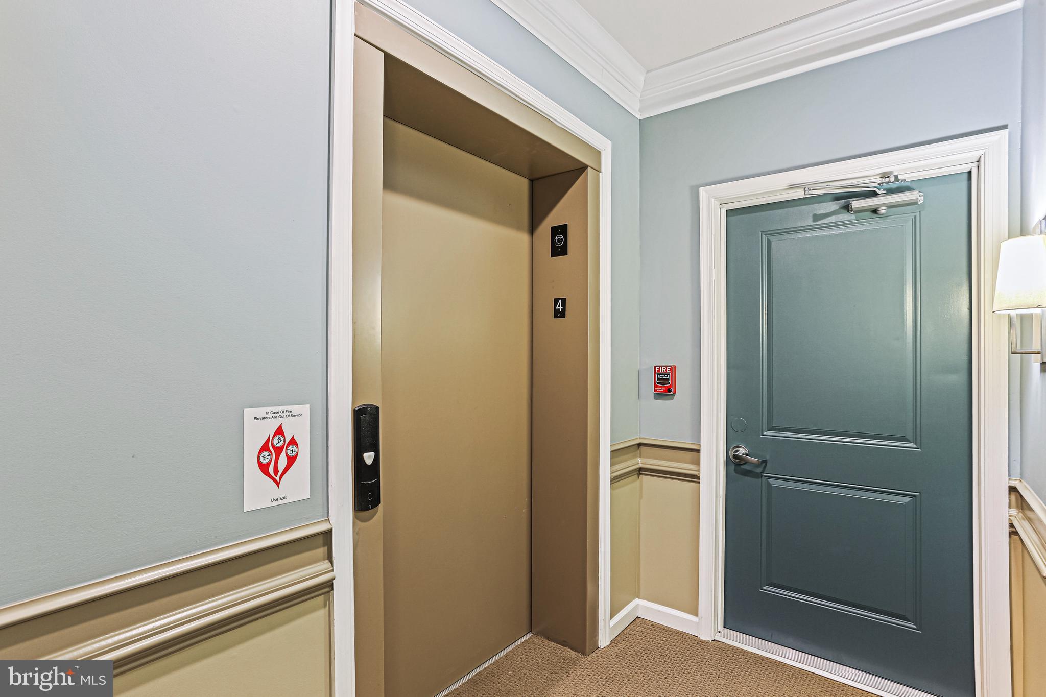 8420 Ice Crystal Drive, Unit P Laurel, MD 20723 - Photo 4 of 32 4thfloor elevator landing - steps away from unit
