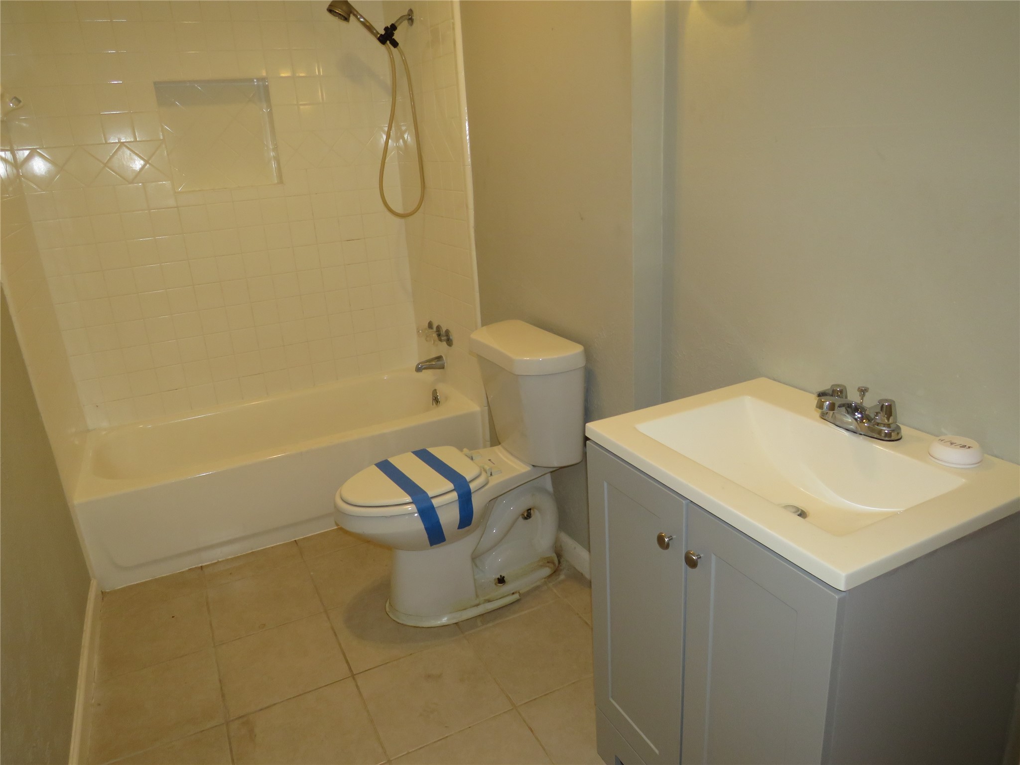 18703 Shay Lane Humble, TX 77346 - Photo 12 of 18 a bathroom with a sink a toilet and shower