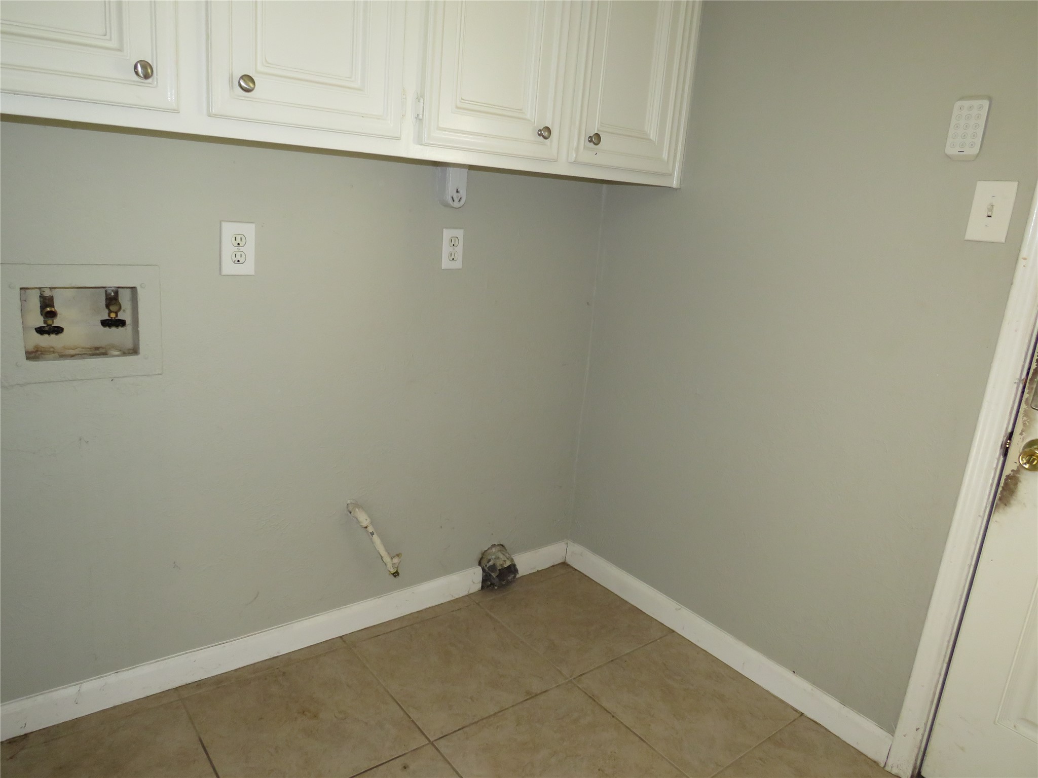 18703 Shay Lane Humble, TX 77346 - Photo 6 of 18 a view of cabinets