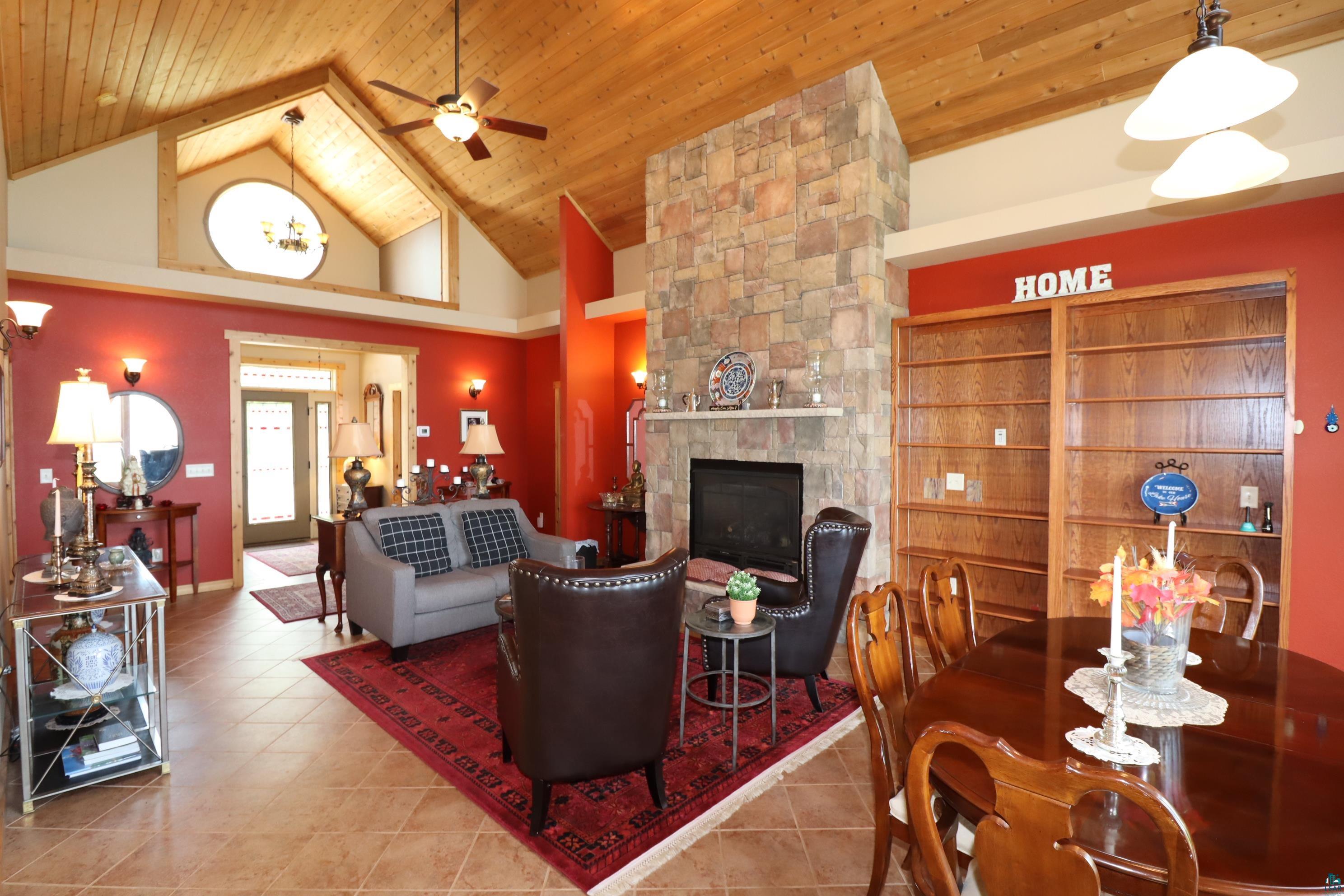 55181 Corbine Road Ashland, WI 54806 - Photo 10 of 43 Vaulted ceiling great room with stone fireplace.