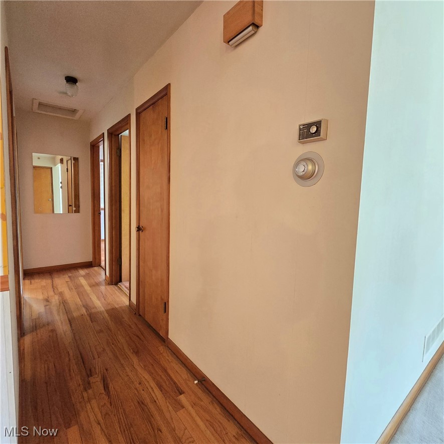 2317 Liberty Road Stow, OH 44224 - Photo 14 of 29 Hallway featuring hardwood flooring