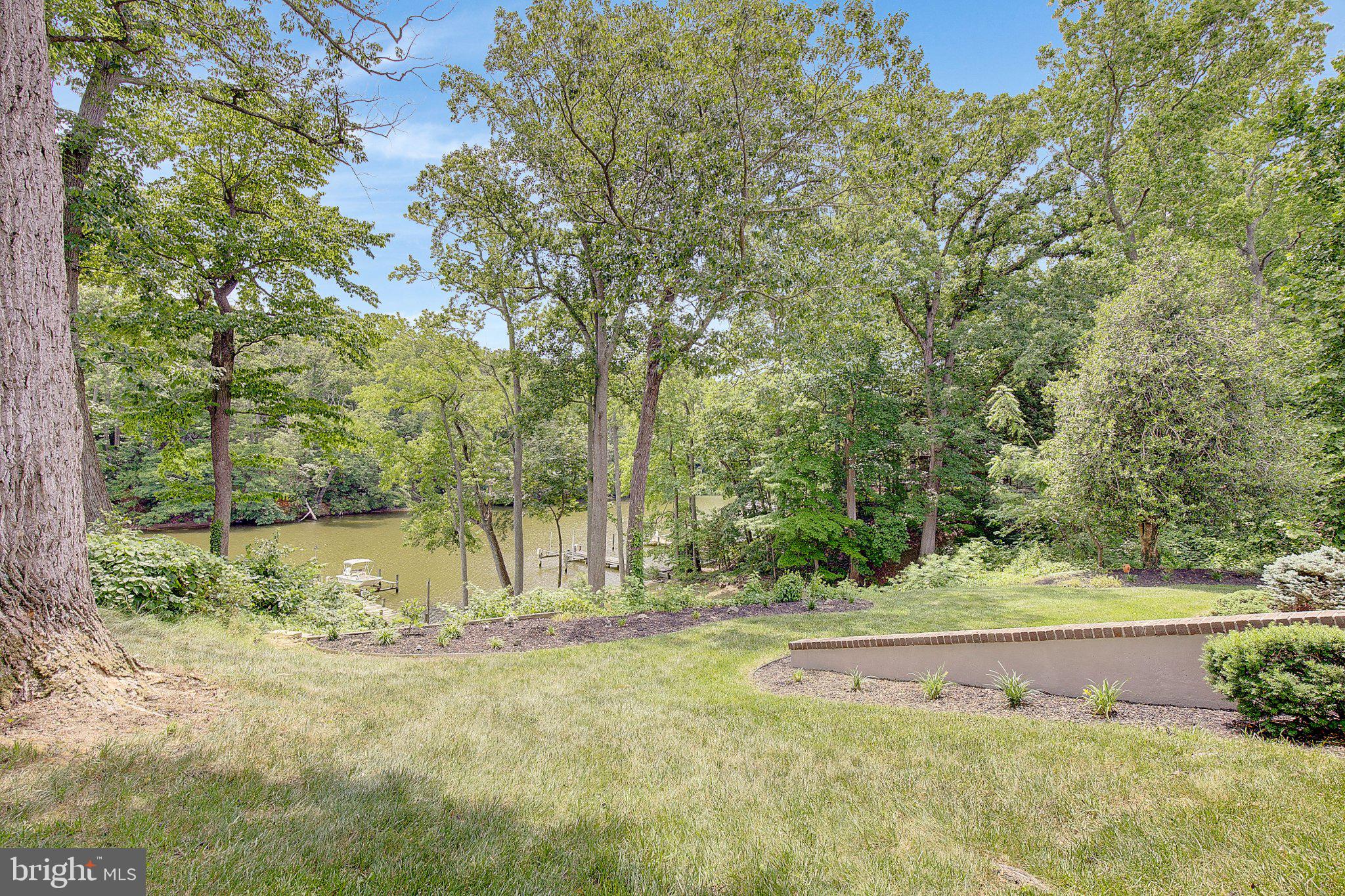 3088 Tudor Hall Road Riva, MD 21140 - Photo 9 of 62 Serene riverside retreat in lush greenery.