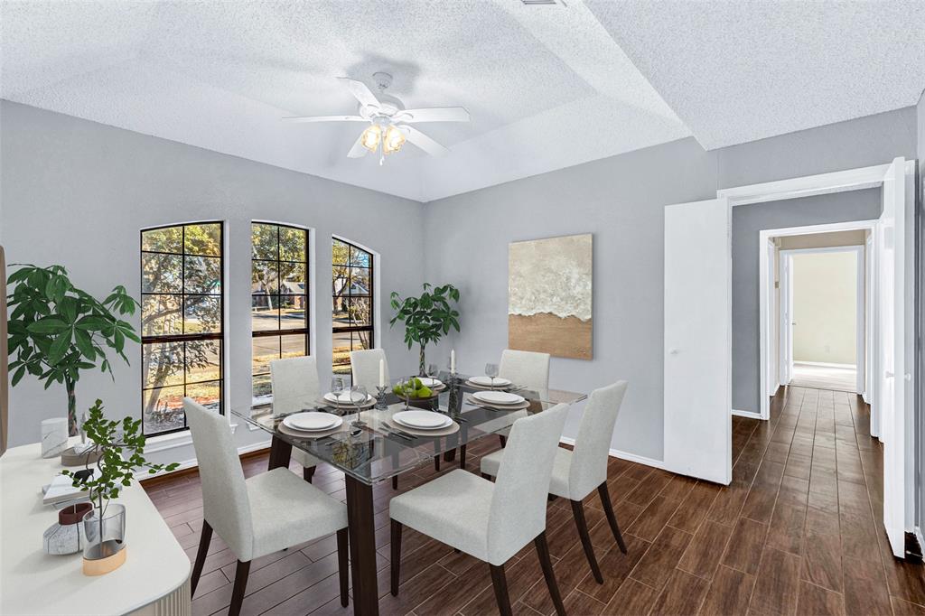 710 Cimarron Trail Irving, TX 75063 - Photo 25 of 39 a view of a dining room with furniture and window