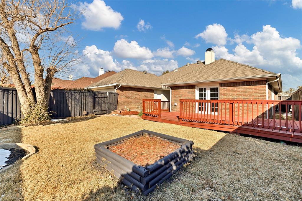 710 Cimarron Trail Irving, TX 75063 - Photo 34 of 39 a view of a house with backyard porch and sitting area