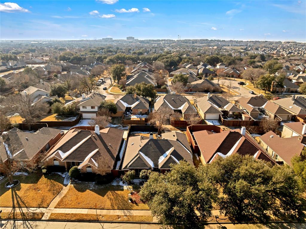 710 Cimarron Trail Irving, TX 75063 - Photo 36 of 39 an aerial view of residential houses with outdoor space