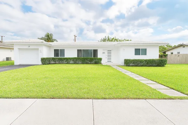 a view of a house with a swimming pool