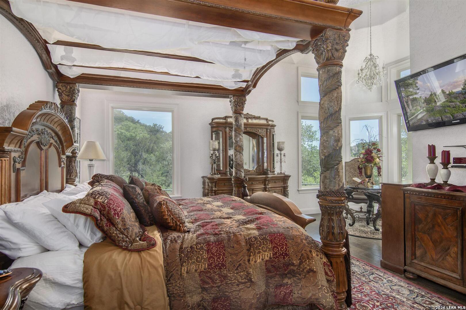 9469 Canyon Mist Helotes, TX 78023 - Photo 20 of 50 a bed sitting in a bedroom next to a window