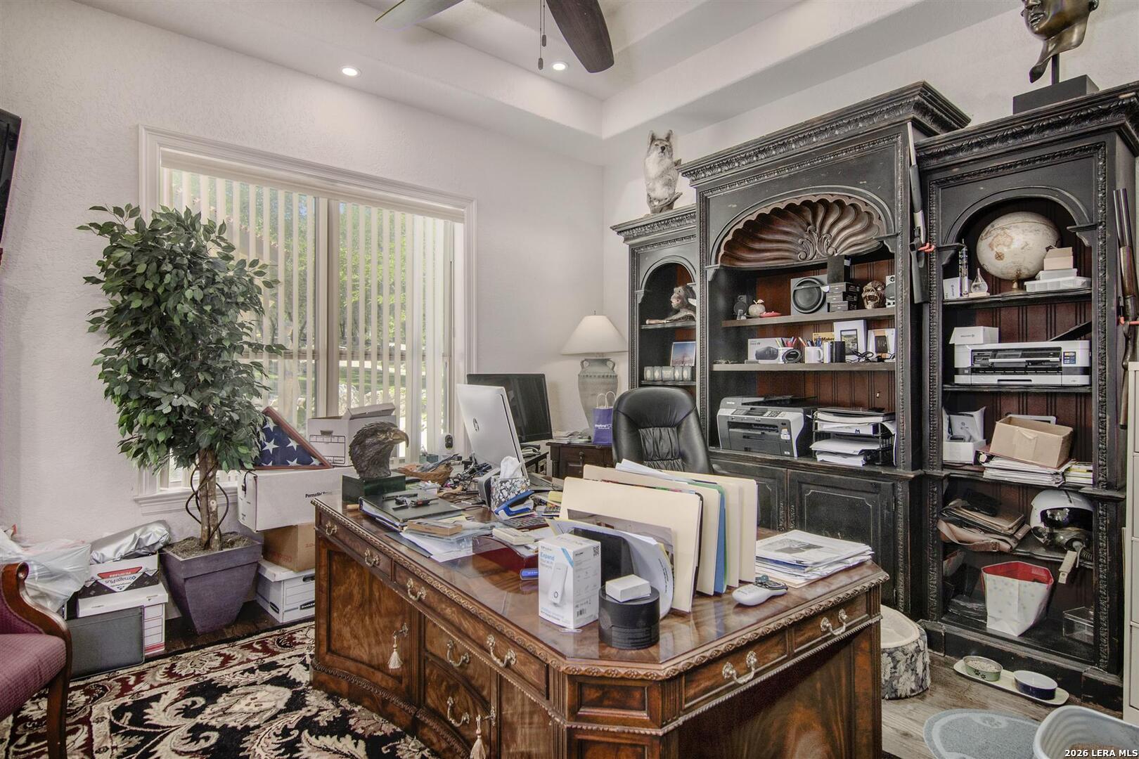 9469 Canyon Mist Helotes, TX 78023 - Photo 23 of 50 a view of kitchen and sink with wooden cabinets