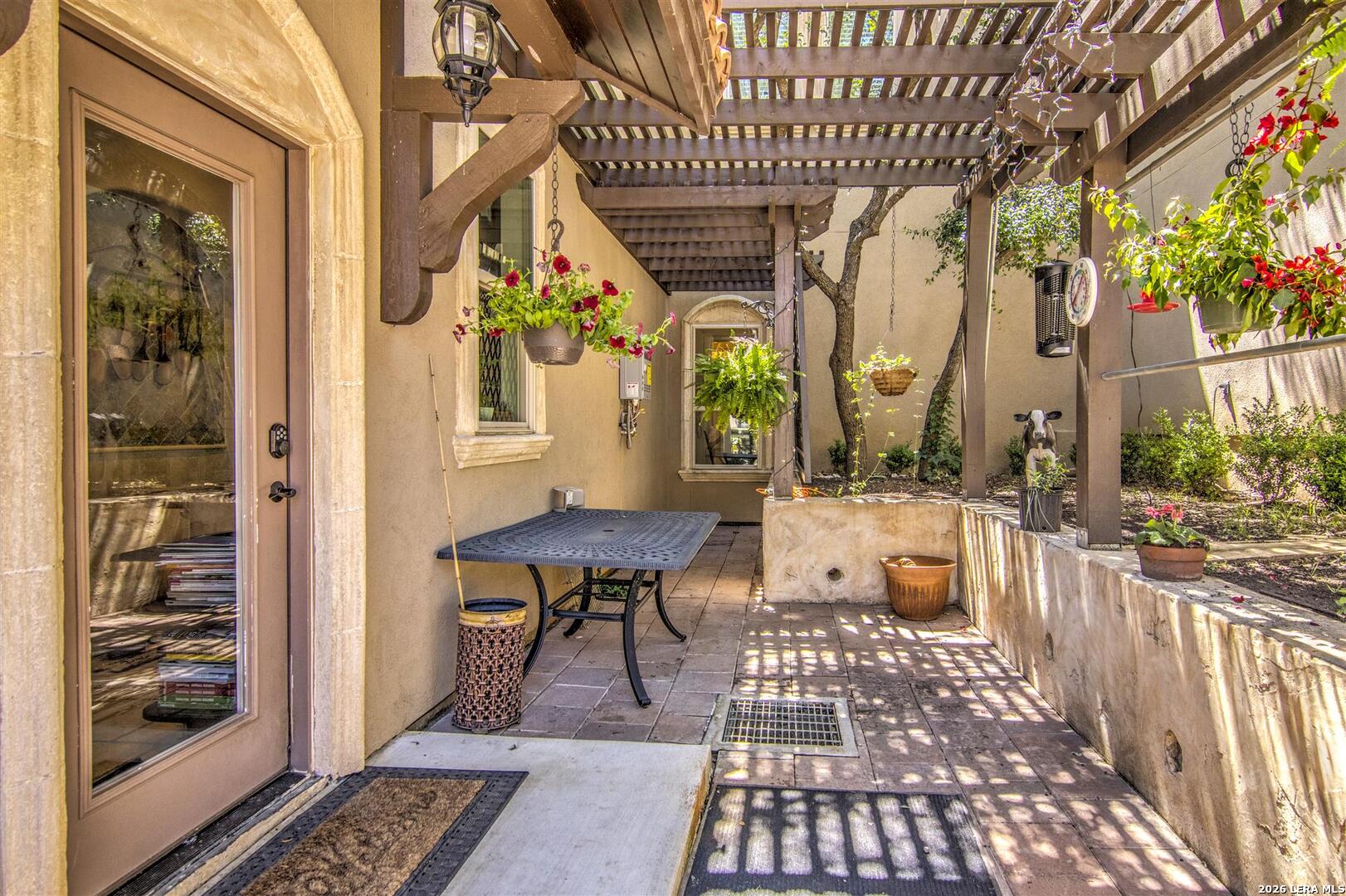 9469 Canyon Mist Helotes, TX 78023 - Photo 36 of 50 a balcony with furniture and a potted plant