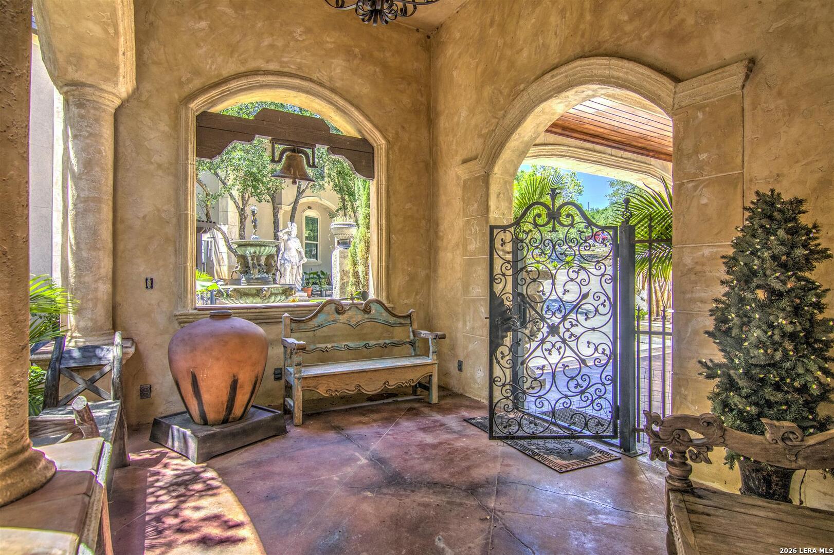 9469 Canyon Mist Helotes, TX 78023 - Photo 40 of 50 a room with a balcony a bed and a chair