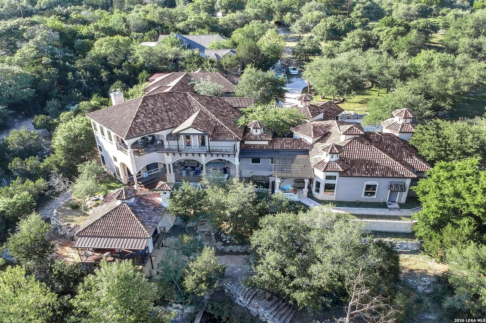 9469 Canyon Mist Helotes, TX 78023 - Photo 4 of 50 an aerial view of a house