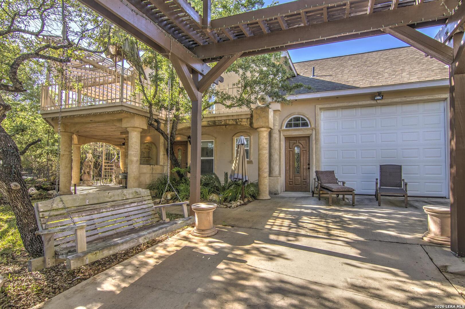 9469 Canyon Mist Helotes, TX 78023 - Photo 44 of 50 a front view of a house with a outdoor space