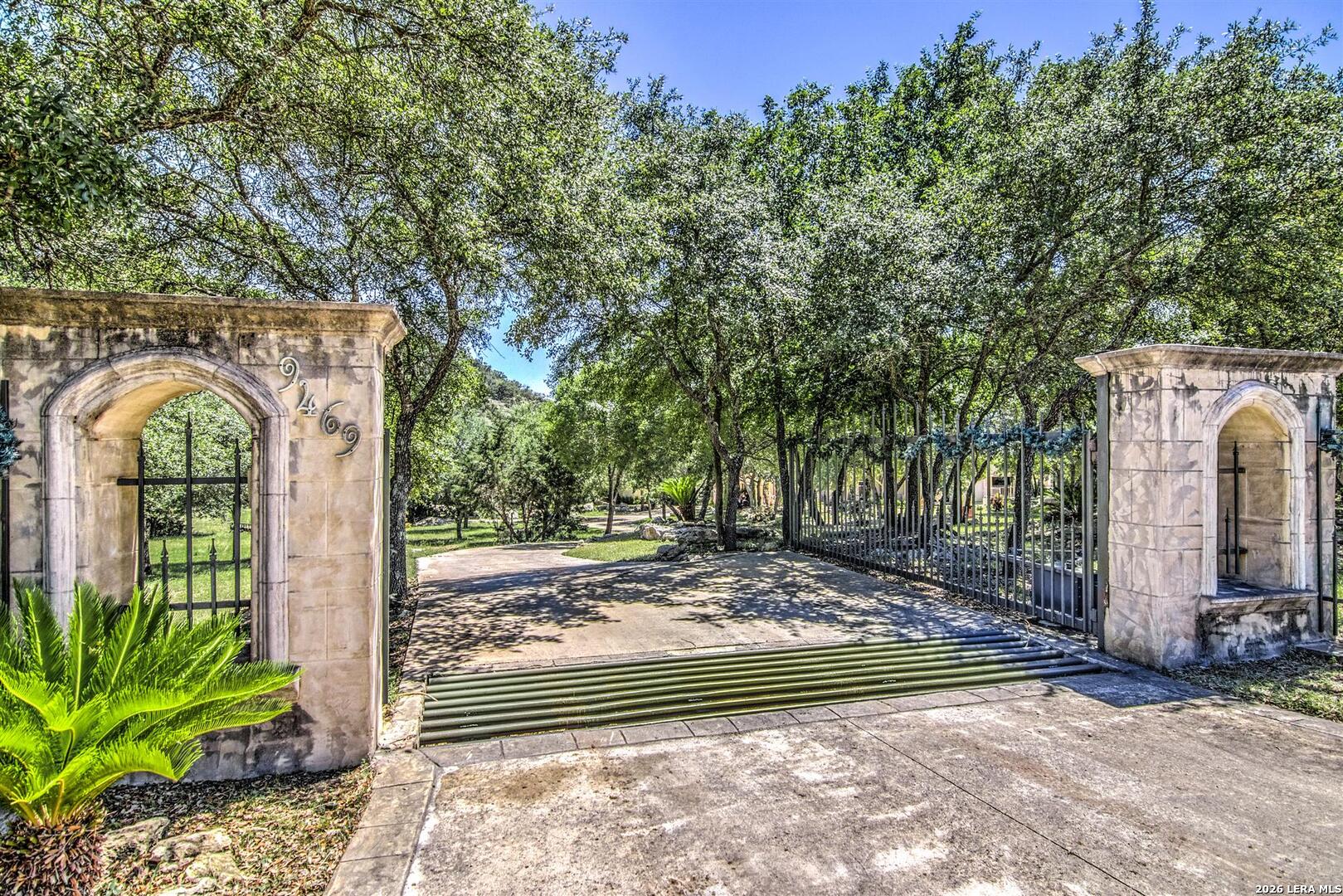9469 Canyon Mist Helotes, TX 78023 - Photo 6 of 50 a view of a garden with a pathway