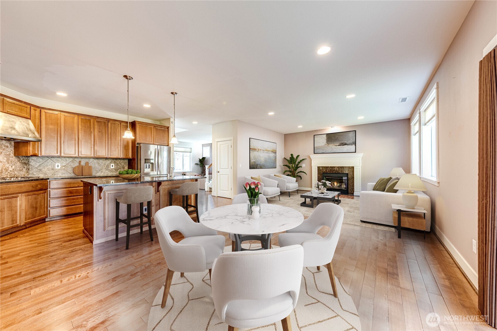 21914 78th Place West Edmonds, WA 98026 - Photo 11 of 39 a view of a dining room with furniture kitchen and wooden floor