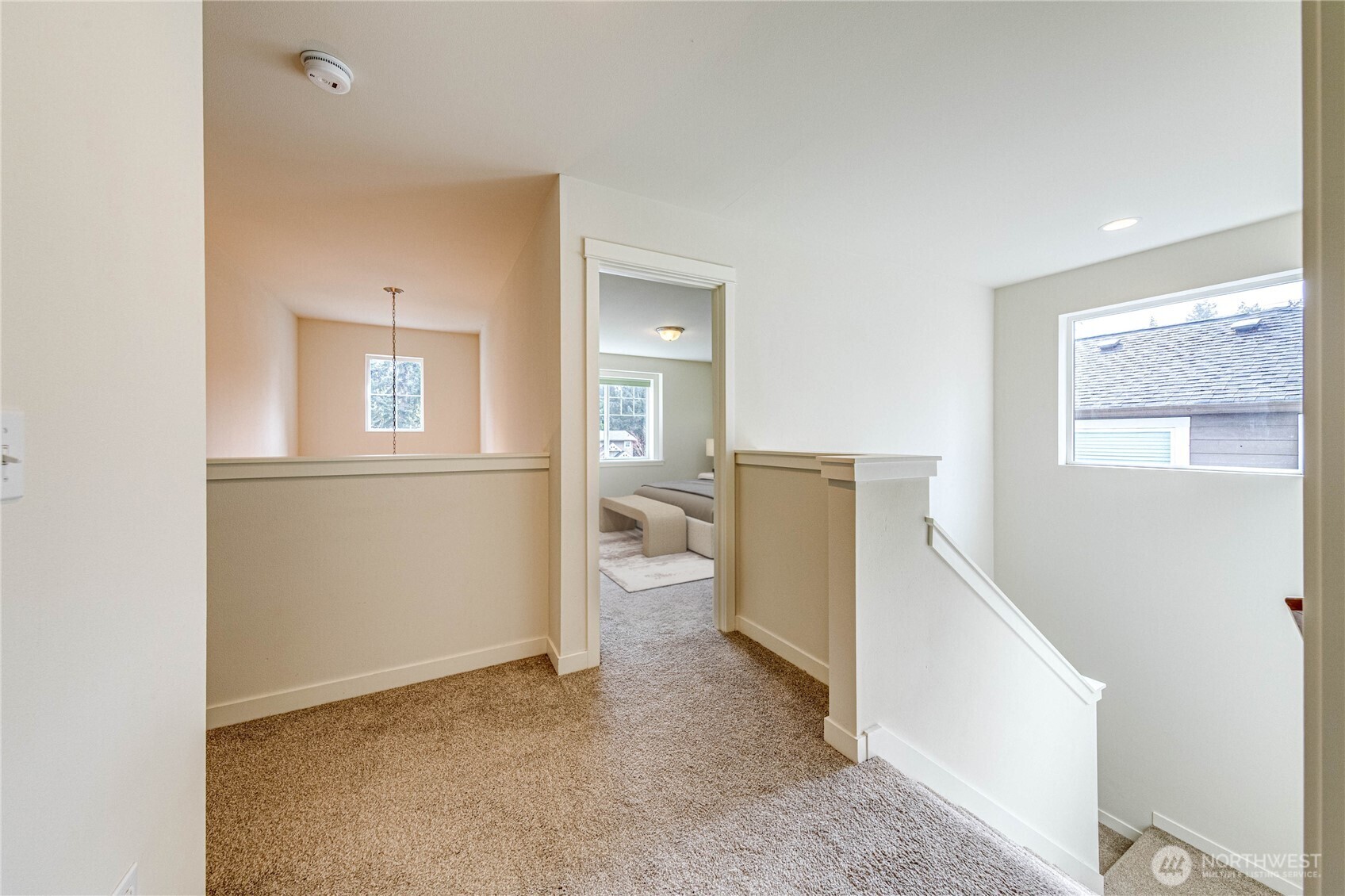 21914 78th Place West Edmonds, WA 98026 - Photo 19 of 39 a view of a room with wooden floor and windows