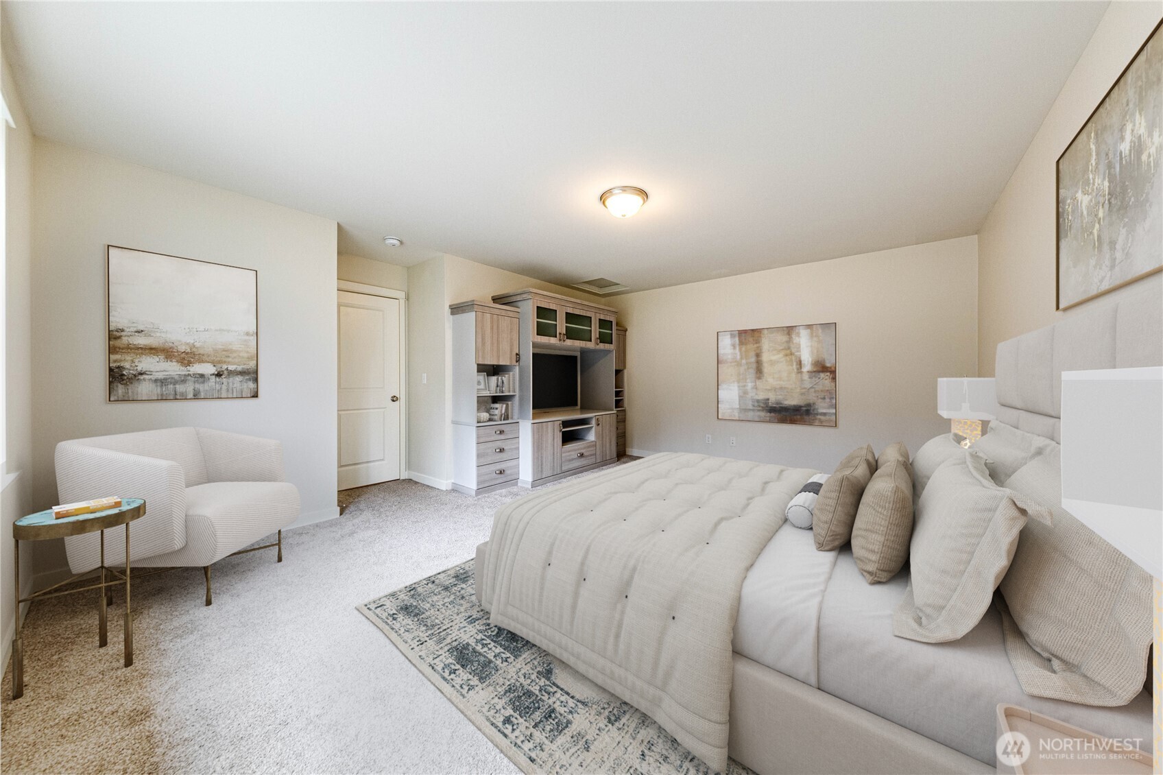 21914 78th Place West Edmonds, WA 98026 - Photo 25 of 39 a spacious bedroom with a bed and a couch