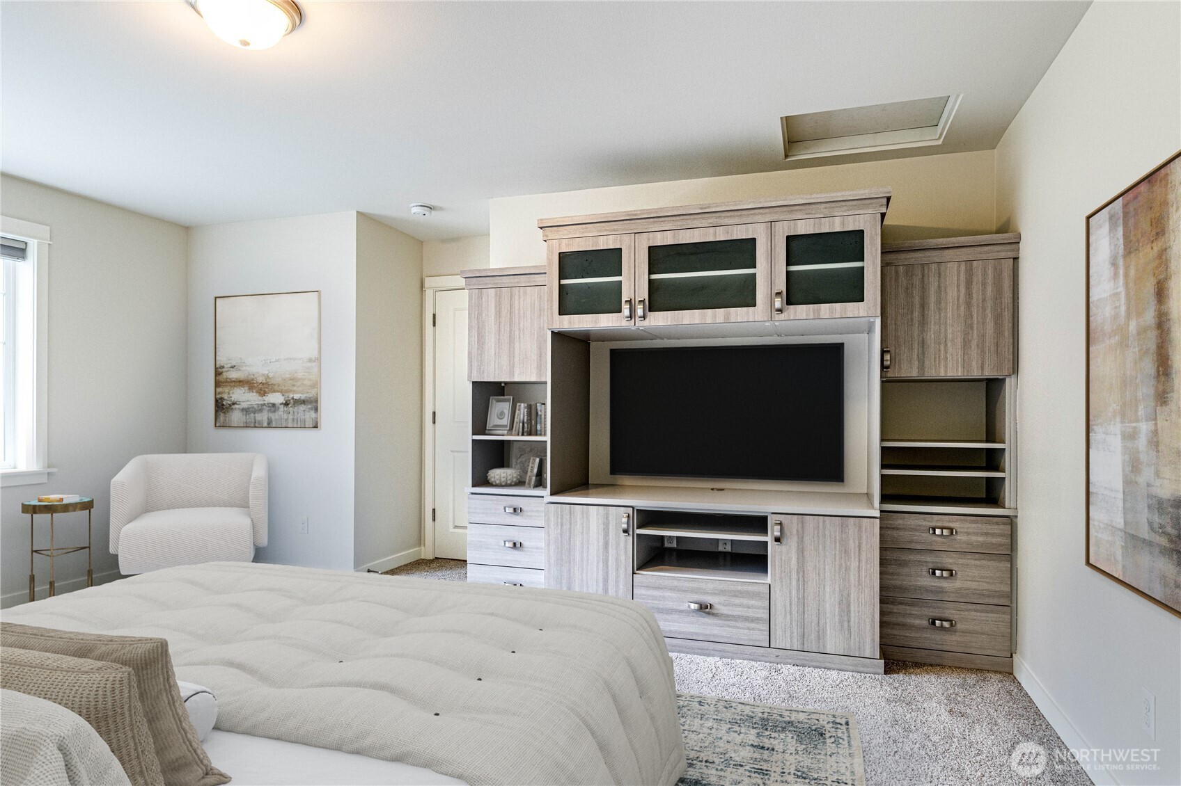 21914 78th Place West Edmonds, WA 98026 - Photo 26 of 39 a bedroom with a bed and a flat screen tv