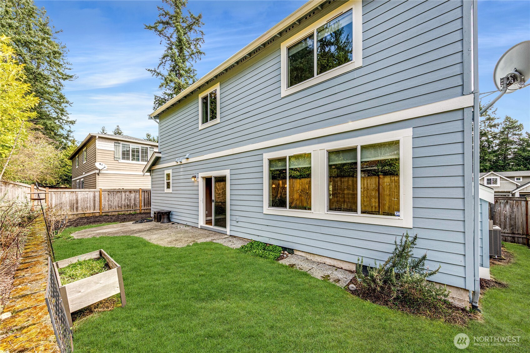 21914 78th Place West Edmonds, WA 98026 - Photo 29 of 39 a view of a house with a yard and furniture
