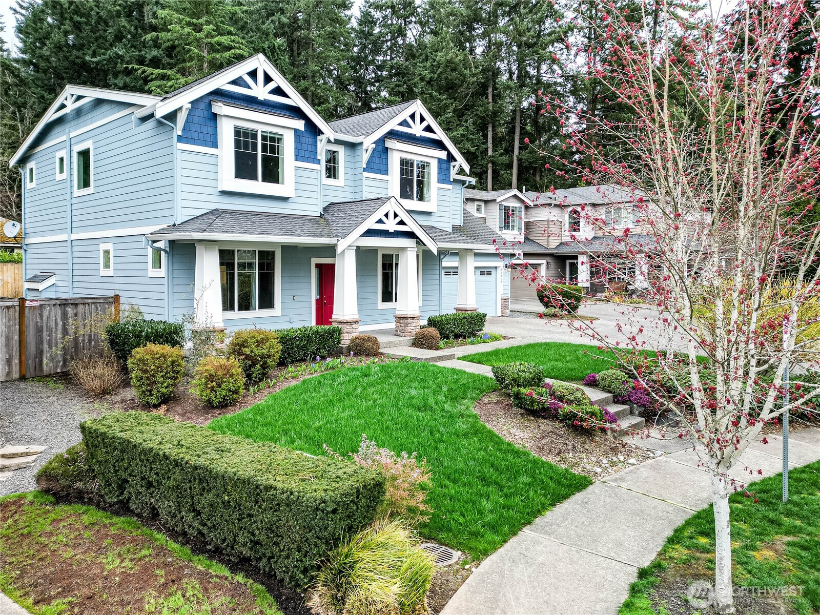 21914 78th Place West Edmonds, WA 98026 - Photo 3 of 39 a front view of a house with a yard