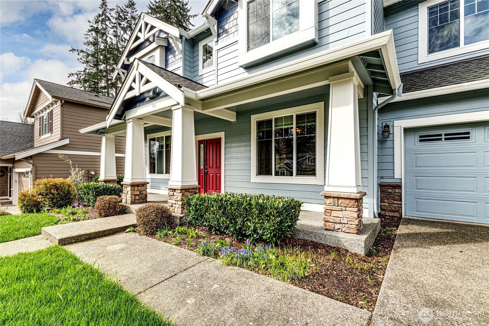 21914 78th Place West Edmonds, WA 98026 - Photo 34 of 39 a front view of a house with garden