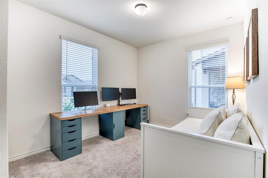 2513 Wayne Avenue Aubrey, TX 76227 - Photo 20 of 27 a view of a workspace with furniture and a window