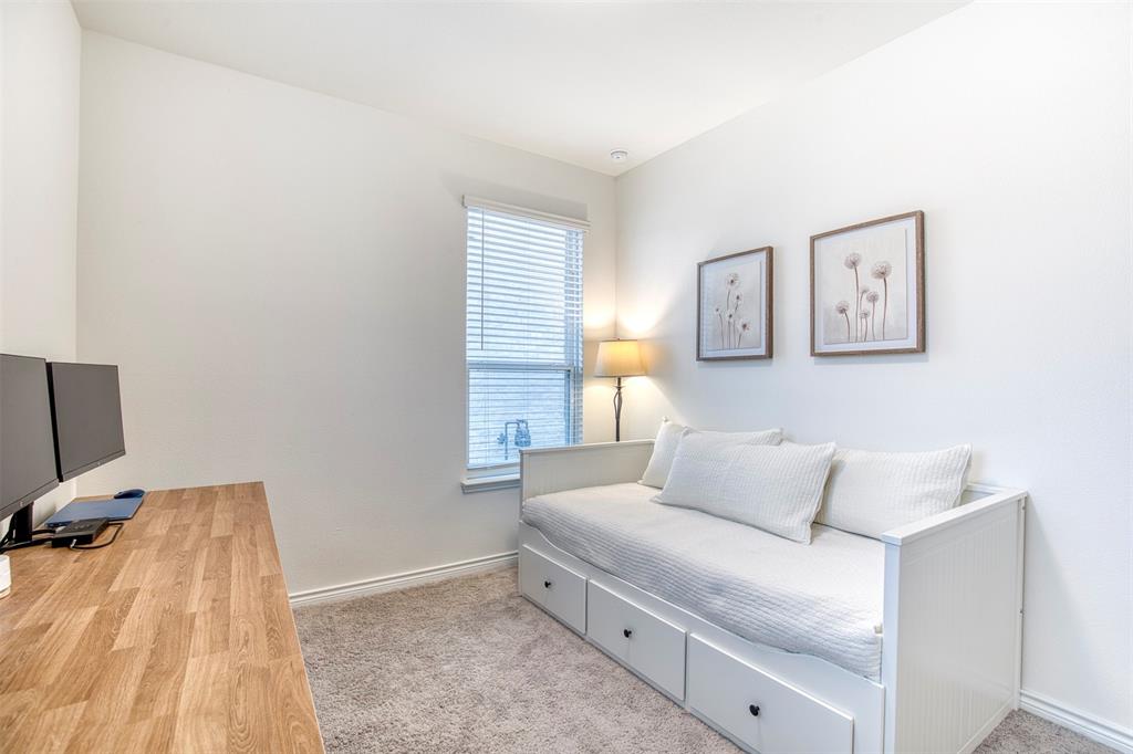 2513 Wayne Avenue Aubrey, TX 76227 - Photo 21 of 27 a bedroom with a bed and a window