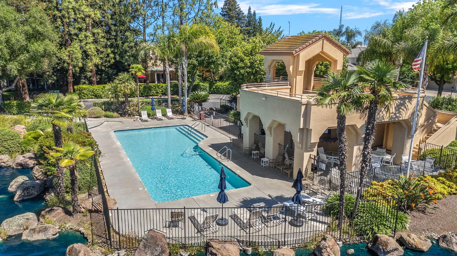 1013 Copper Lake Court Modesto, CA 95355 - Photo 54 of 66 a view of a house with a garden and a trees