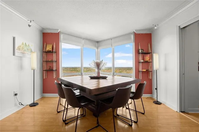 a view of a dining room with furniture window and outside view
